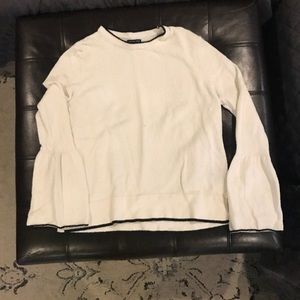 White sweater with flare sleeves